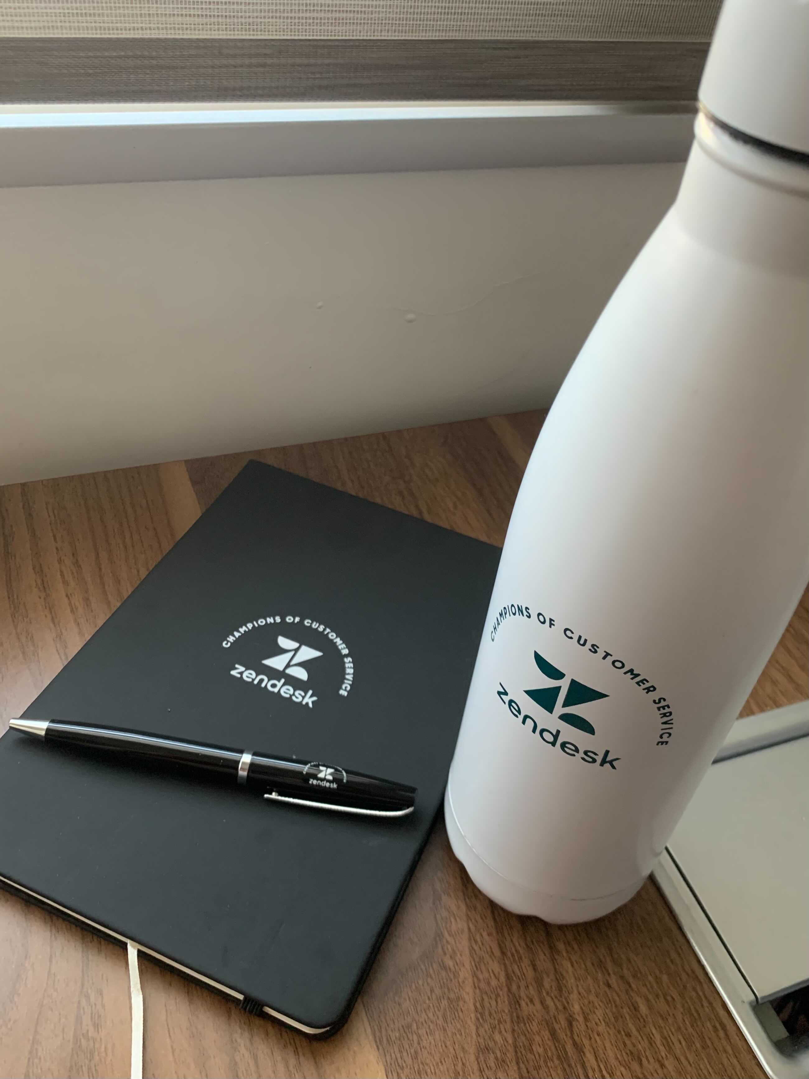 white-tumbler zendesk notebook pen tumbler